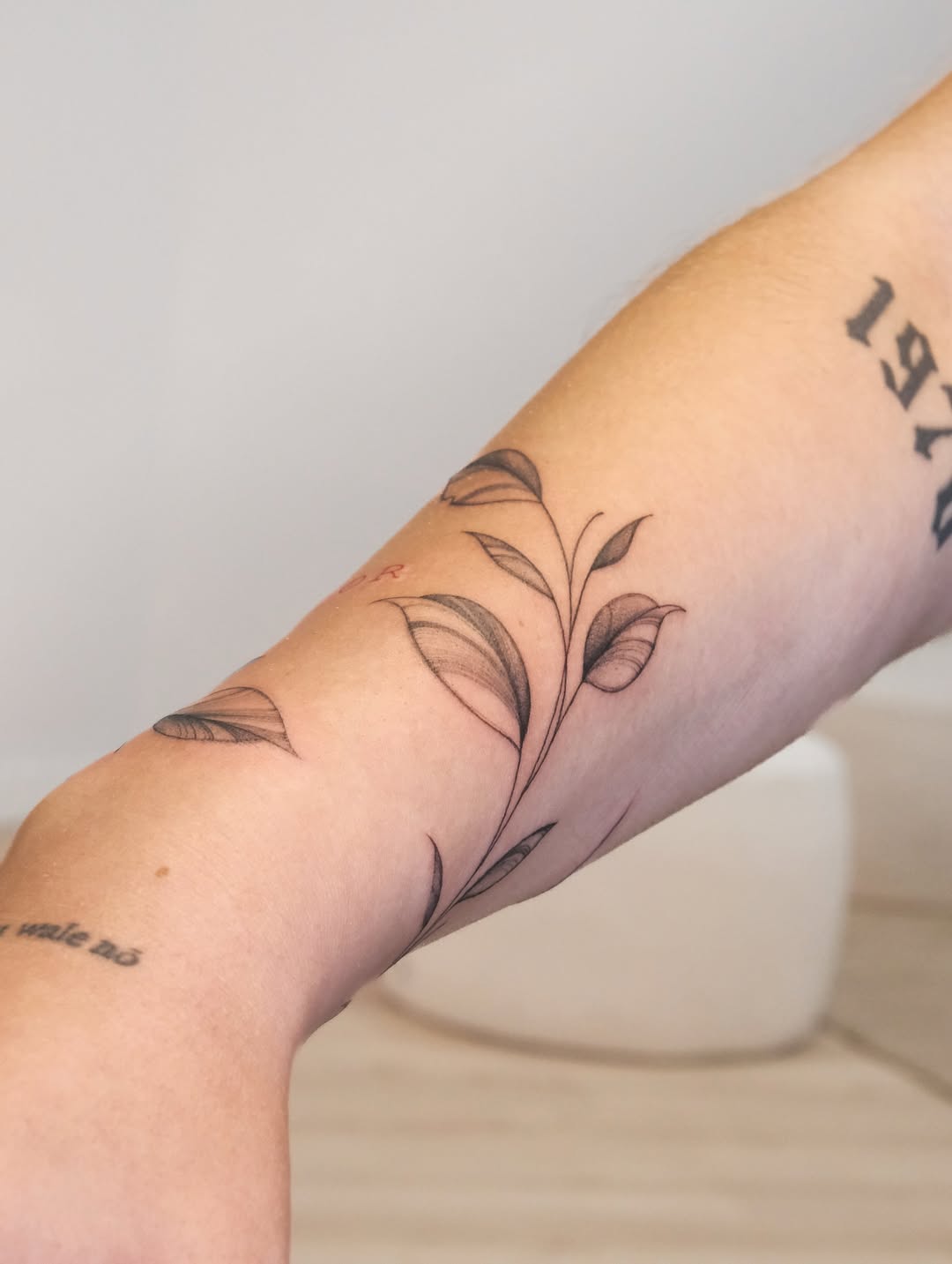 Fineline floral tattoo