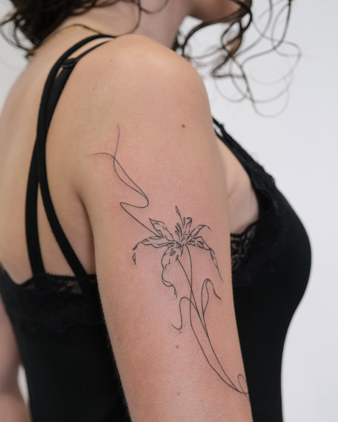 Fineline floral tattoo