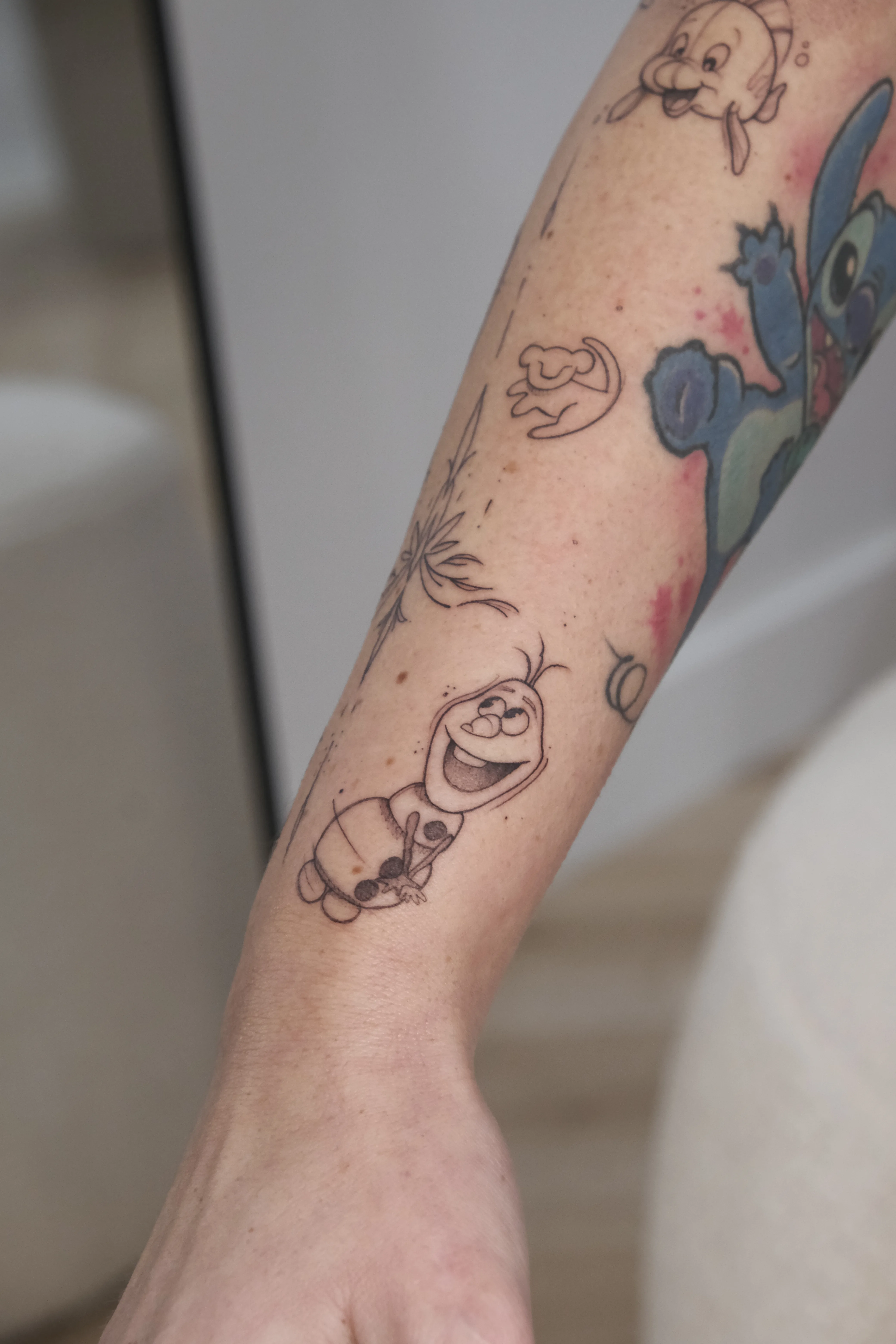 Disney sleeve tattoo