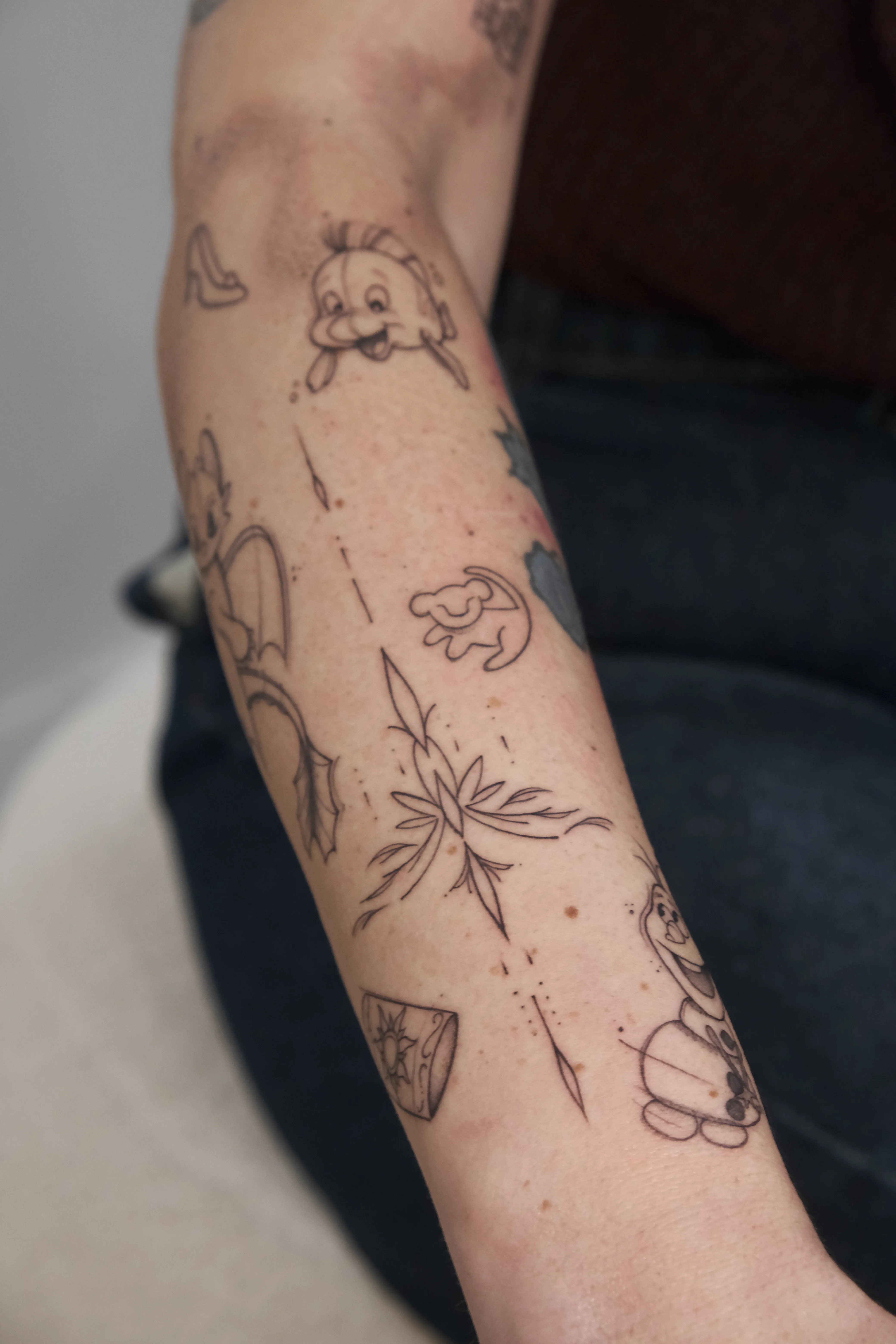 Disney sleeve tattoo