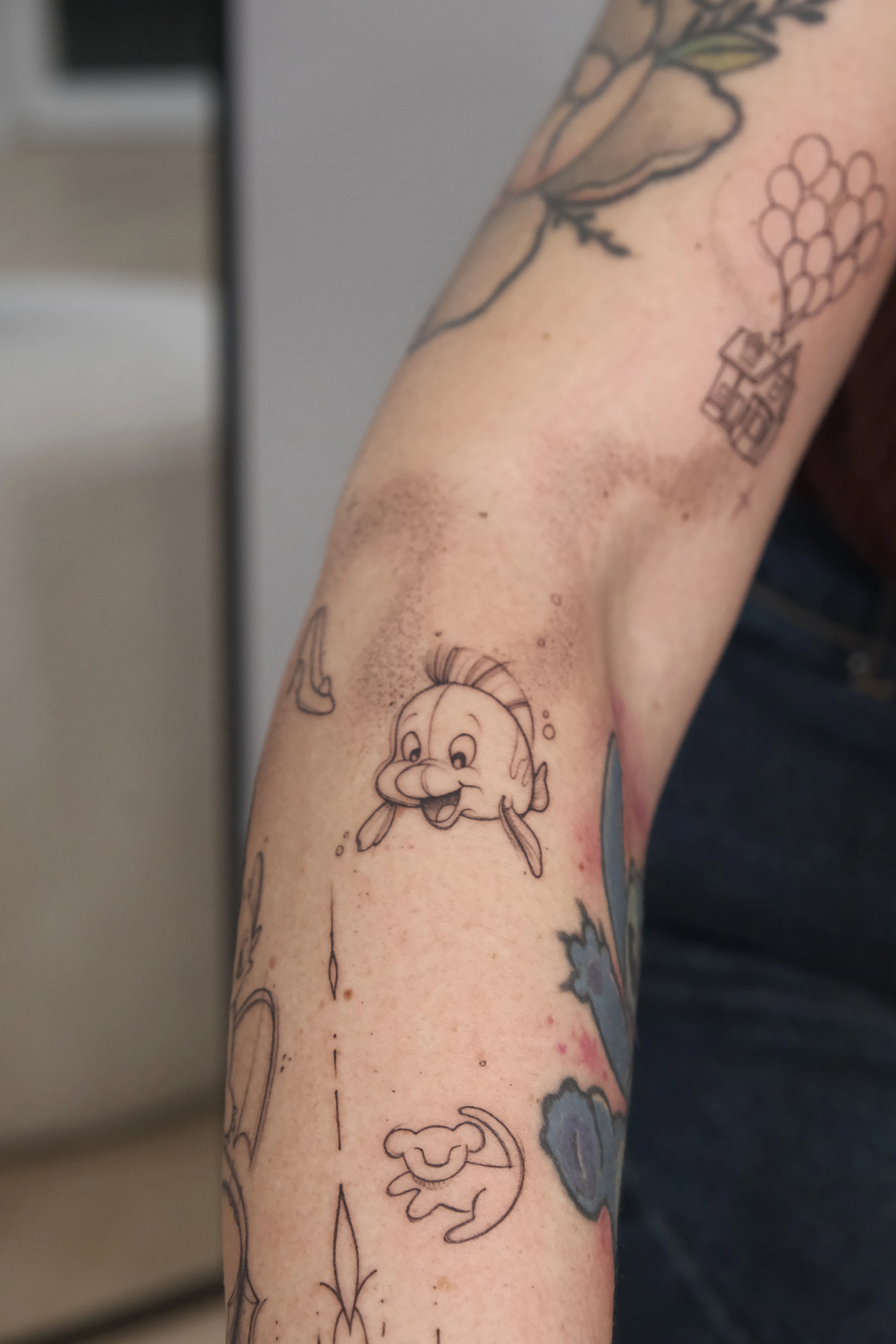 Disney sleeve tattoo